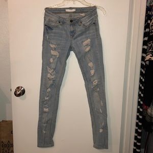 Distressed white wash skinny jeans